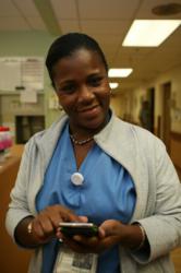 Nurse using Voalté iPhone